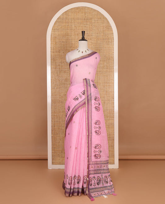 Pink buttas with mirror work linen saree, zari border with peacock motifs print, printed mirror work pallu, and matching blouse