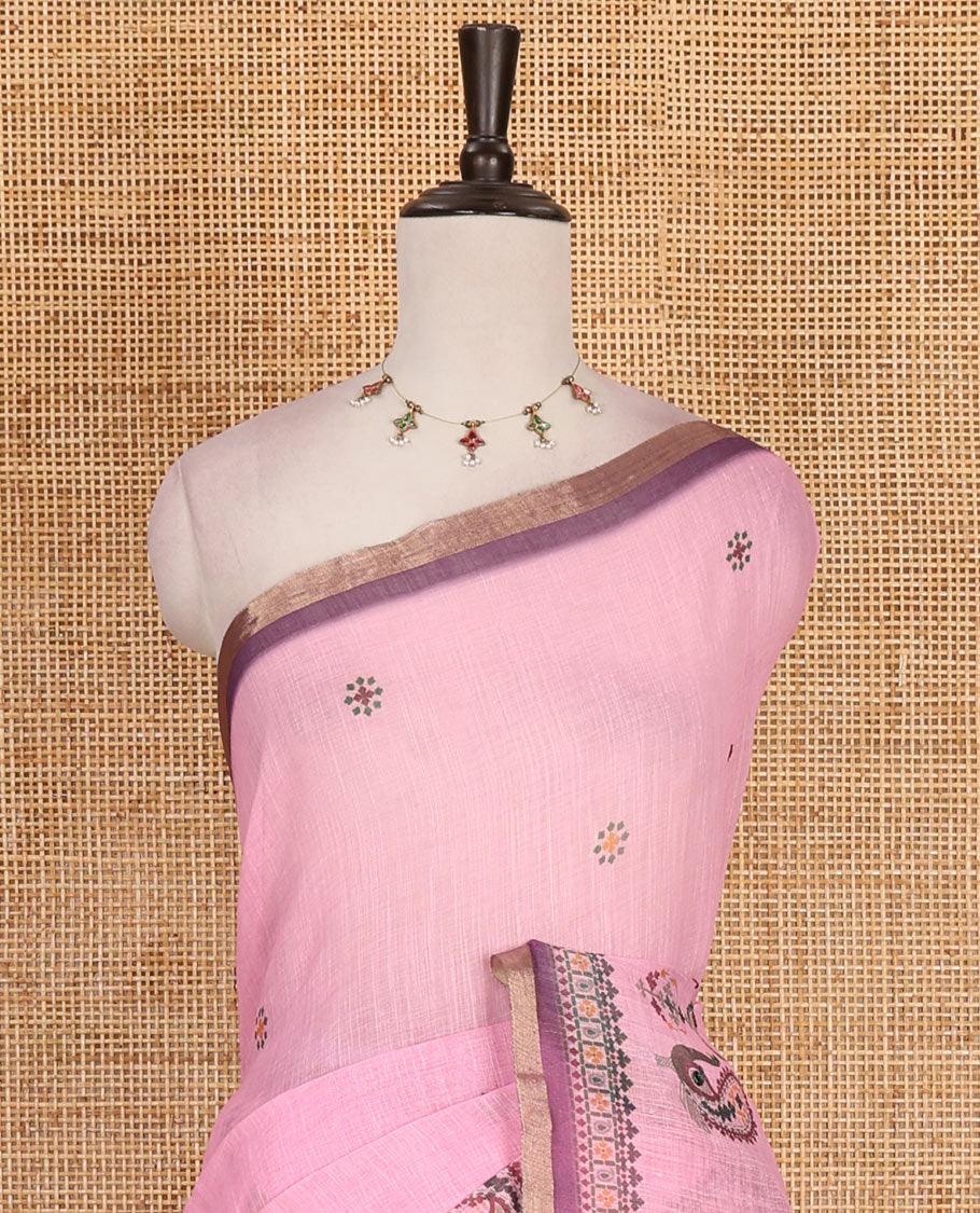Pink buttas with mirror work linen saree, zari border with peacock motifs print, printed mirror work pallu, and matching blouse