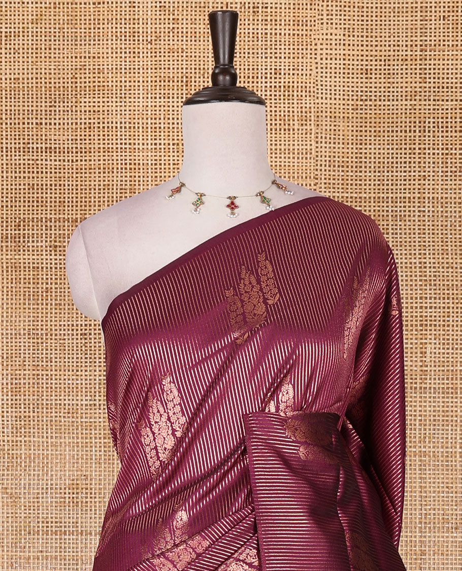 Borderless purple stripes and zari floral buttas elite soft silk saree, contrast ogee patterned zari pallu, and contrast zari design blouse