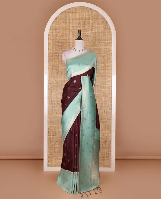 Maroon zari buttas soft silk saree, contrast zari design border, intricate jaal pallu, and contrast zari design blouse
