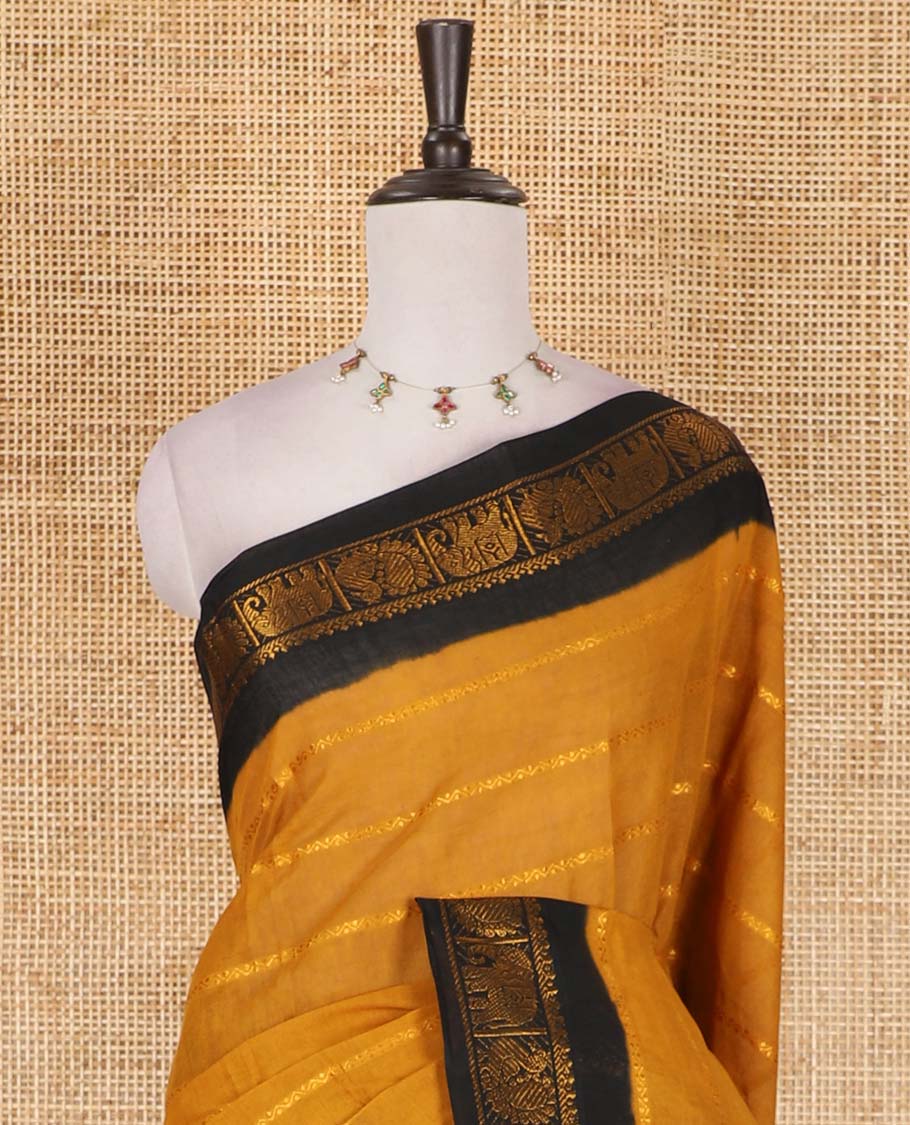 Mustard veldhari zari striped Sungudi cotton saree, contrast peacock and elephant motif border, striped pallu, and contrast zari design blouse