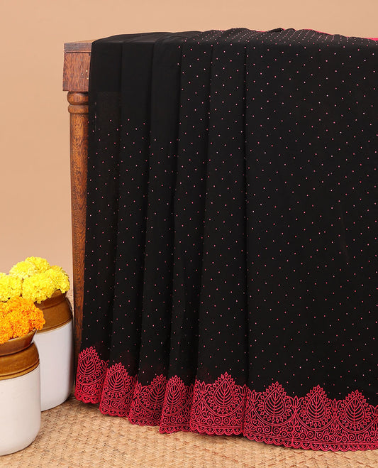 Black with pink all-over stone work chiffon georgette saree with self embroidery border & self pallu along with contrast stone work blouse