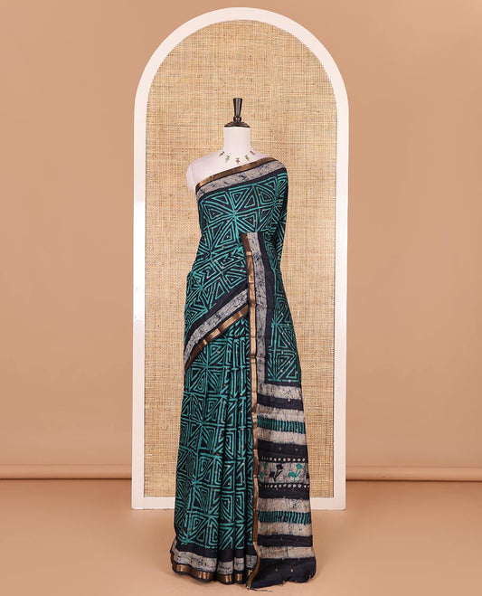 Navy blue and green batik printed with zari buttas woven chanderi cotton saree, zari piping border, batik block printed pallu, and zari buttas matching blouse