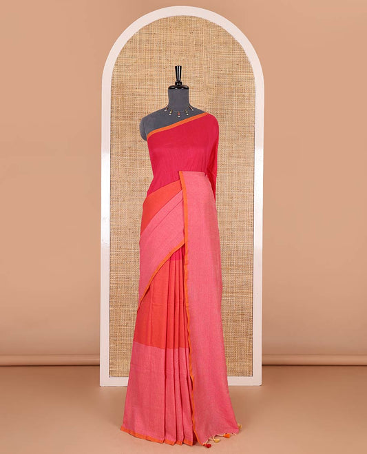 Borderless pink tri-ombre-colored plain khadi mul cotton saree with self-pallu, multi-colored tassels and a matching blouse