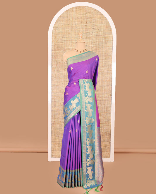 Violet zari buttas elite soft silk saree, contrast traditional zari border of Pichwai cow design, scallop pallu, and a contrast zari design blouse