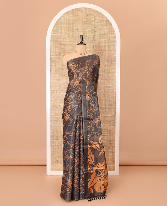 Borderless black big floral motifs printed tissue silk saree with floral printed pallu, and a contrast plain blouse