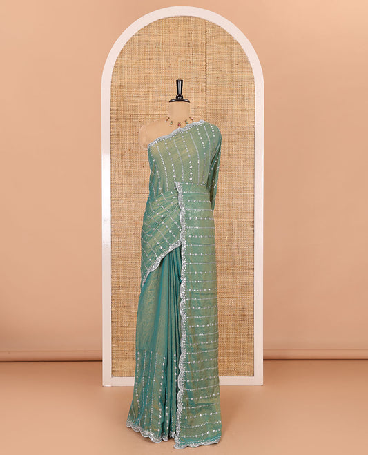 Mehendi vertical stripes embroidered shimmer chiffon saree, scallop embroidered border, embroidered pallu, and fancy embroidered matching blouse