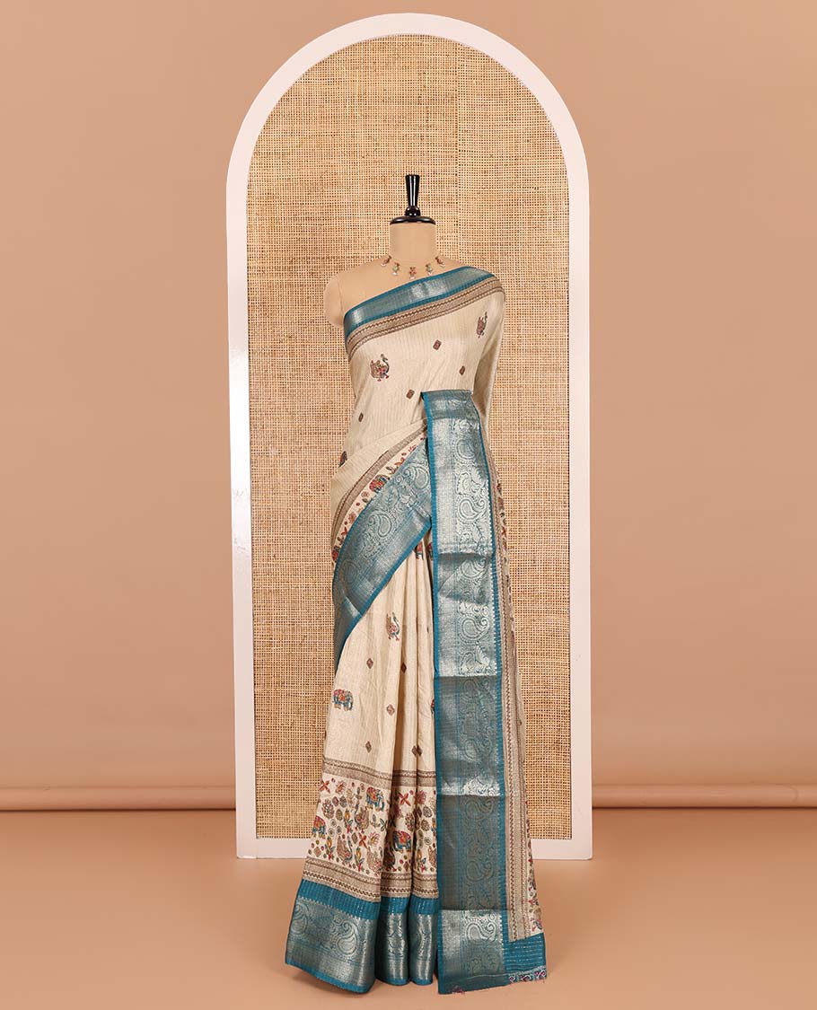 Chikku-rama green vertical striped, and animal motifs printed dola silk saree, contrast manga motifs zari border, animal motifs printed pallu, and a contrast printed blouse