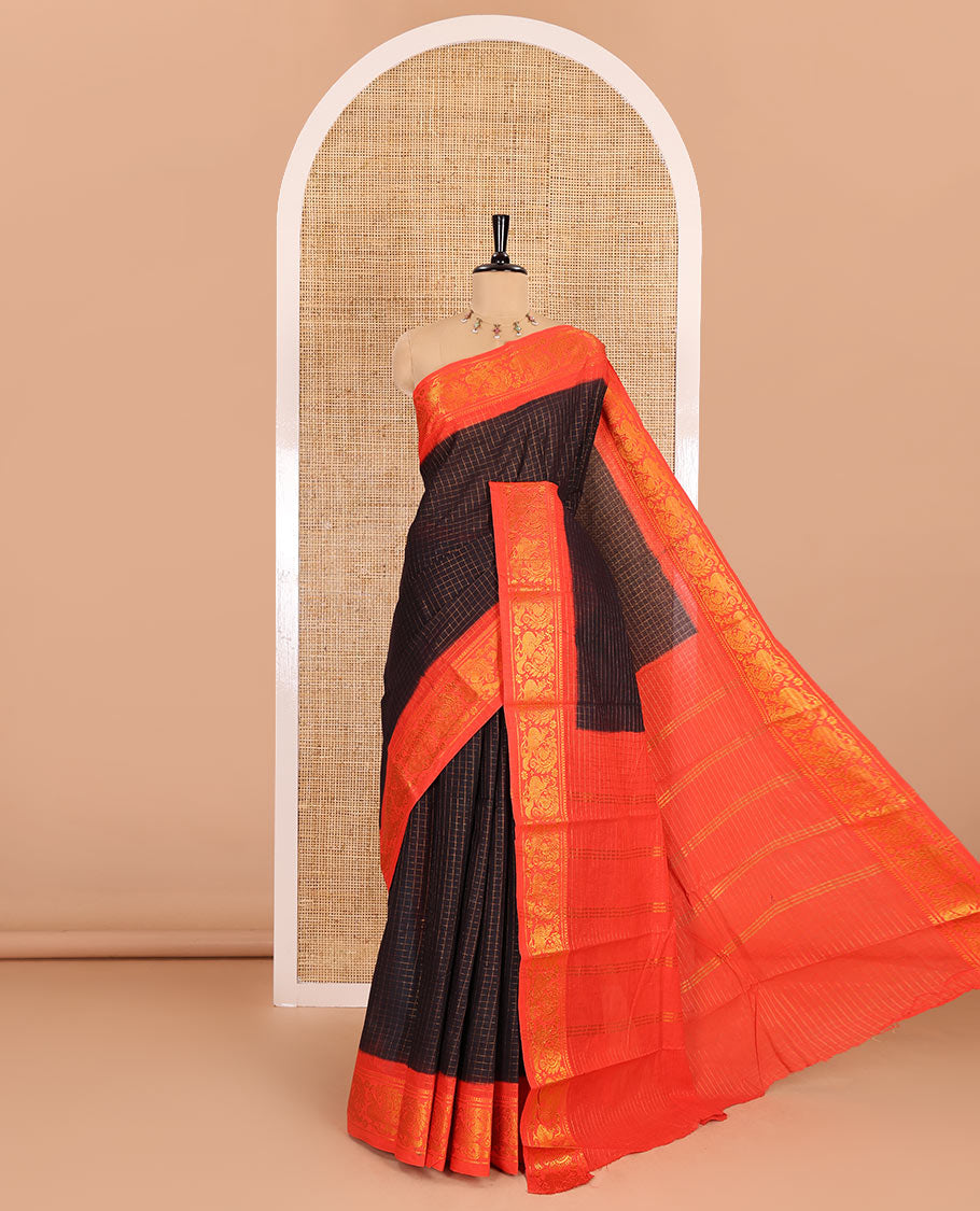 Black zari checked sungudi cotton saree, contrast zari border of peacock motifs, zari striped border, and a contrast blouse