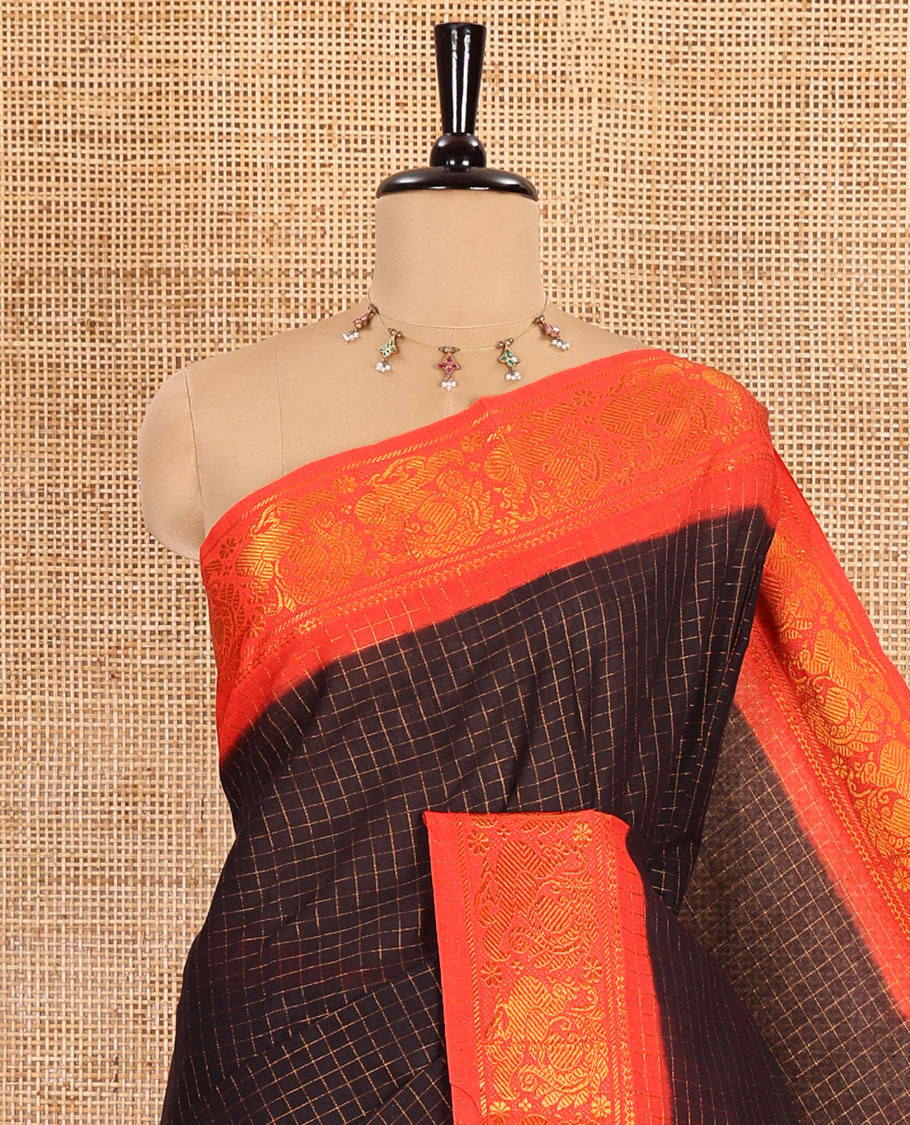 Black zari checked sungudi cotton saree, contrast zari border of peacock motifs, zari striped border, and a contrast blouse