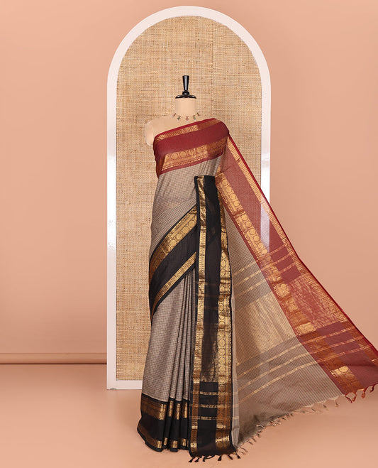 Brown Checked Chettinad Cotton Saree, Accentuated with Contrast Ganga Jamuna Rettai Pettu-Style Rudraksham Motifs Border, Subtly Zari Striped Pallu, and a Matching Blouse
