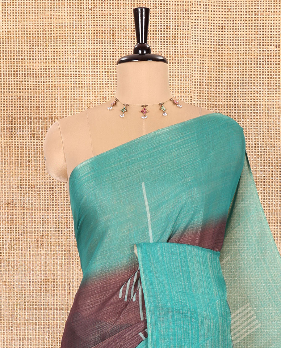 Brown and Rama Green Linen Saree Elegantly Printed with Geometric Patterns Across Its Body, Featuring a Captivating Contrast Border, Pallu Decked Up with Geometric Print, and Paired with a Contrast Blouse