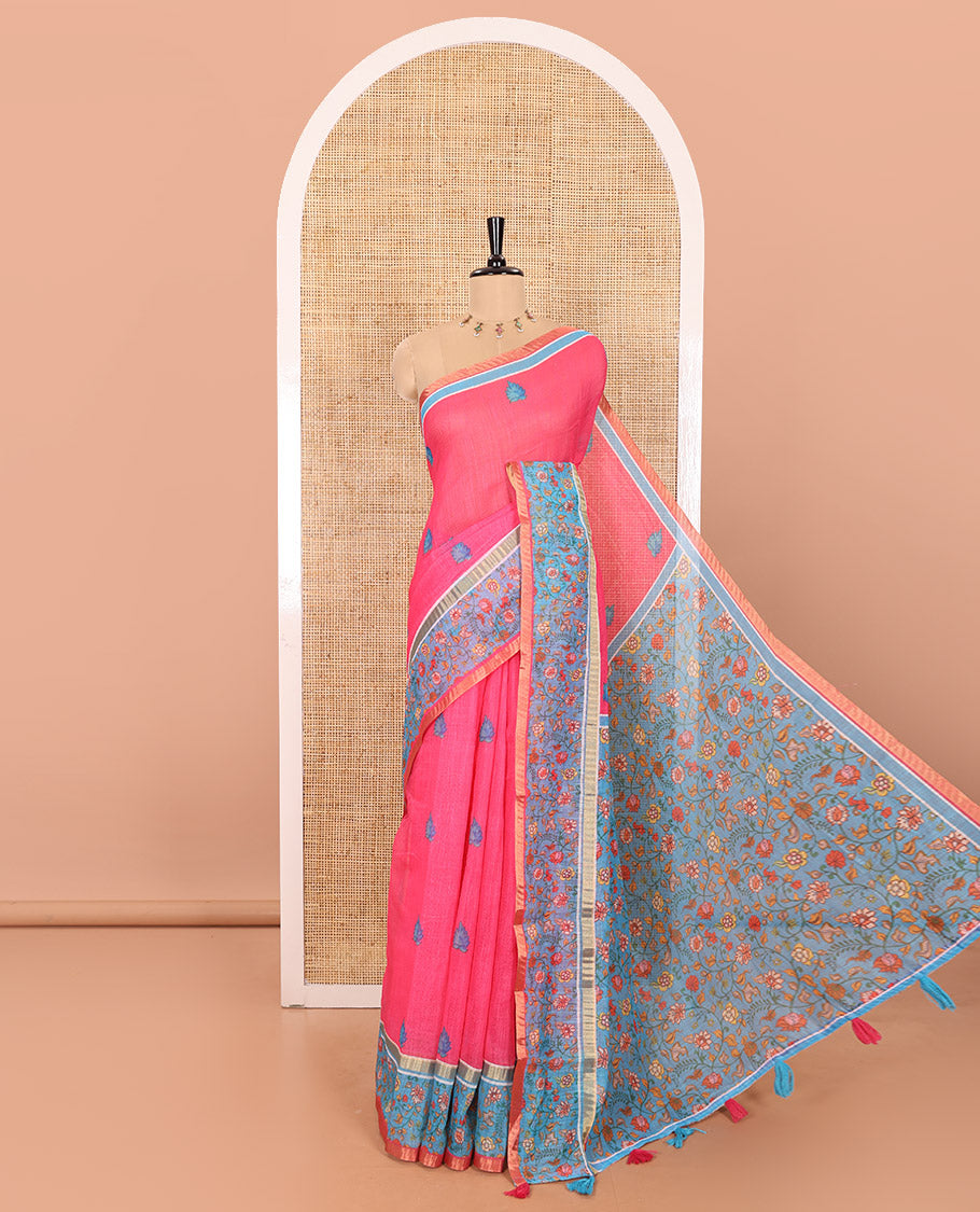 Pink Linen Saree Elevated with Leaf Motifs All Over Its Body, Complemented by a Contrast Floral Vine Printed Border, Pallu Mirrors the Floral Vine Print, and Paired with a  Contrast Floral Printed Blouse