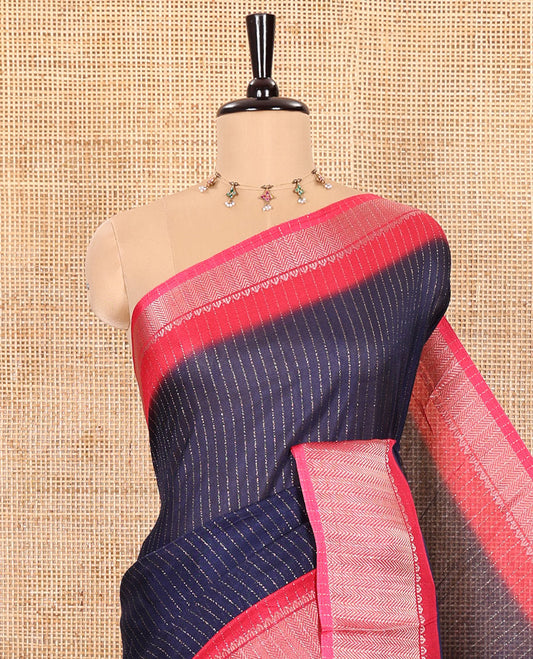 Navy Blue and Pink Dola Silk Saree Subtly Sparked with Vertical Golden Stripes Running All Over Its Body, Complemented by a Contrast Traditional Zari Design Woven Border, Subtly Striped Pallu, and a Contrast Buttas Woven Blouse
