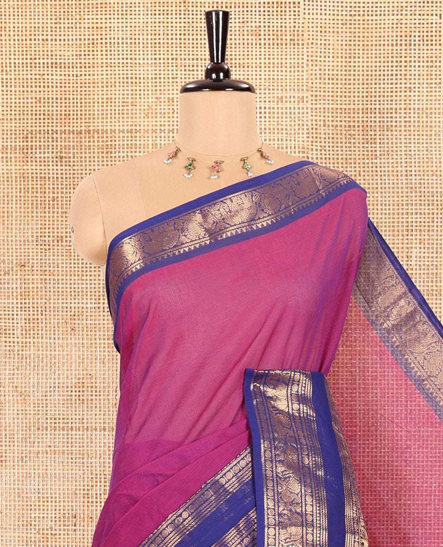 Magenta Plain Chettinad Cotton Saree Beautified with a Contrasting Temple Rettai Pettu Border of Peacock-Elephant Motifs, a Subtle Pallu of Stripes, and a Matching Blouse