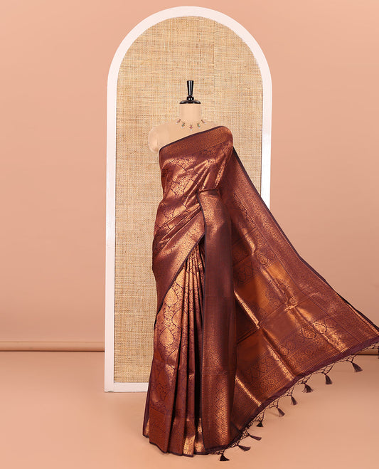 Maroon Kanchi Tissue Saree Embellished with Floral and Thilakam Jacquard Designs, Highlighted with Traditional Zari Design Border, Gleaming Copper Zari Woven Pallu, and Paired with a Matching Blouse