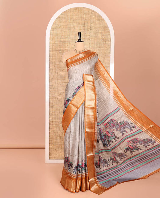 Grey and Mustard Dola Silk Saree Subtly Designed with Checks and Elephant Motifs Print, Complemented by a Contrast Traditional Zari Design Border, Pallu Depicting Elephant Motifs Print, and Paired with a Contrast Blouse
