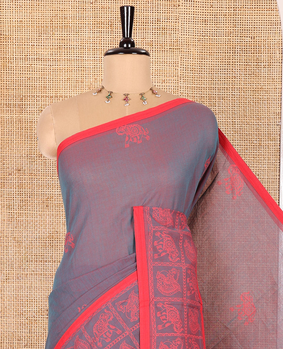 Purple Mangalagiri Cotton Saree Decked Up with Elephant Motifs Block Print All Over Its Body, Subtly Printed Border of Animal Butta Enclosed Checks, Pallu Mirrors the Same Border Print, and Paired with a Contrast Printed Blouse