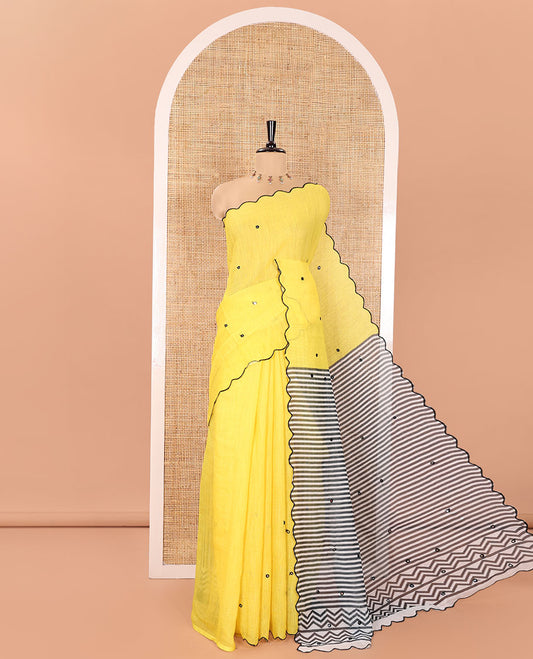 Yellow Linen Cotton Saree, Decorated with Mirror Work All Over Its Body, Subtly Scallop Border, Complemented by Contrast Pallu of Stripes and Mirror Work, and Paired with a Contrast Geometric Printed Blouse