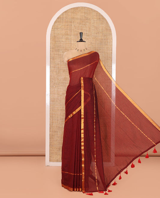 Maroon Plain Khadi Mul Cotton Saree, Subtly Sparkled with Zari Border, Self-Pallu, and Paired with a Matching Blouse
