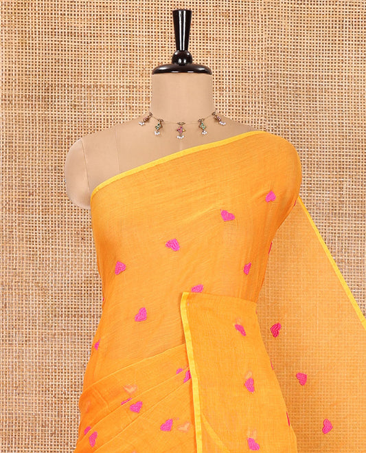 Borderless Orange Khadi Mul Cotton Saree, Artfully Designed with Heart Motifs Embroidery Across Its Body, Pallu mirrors the Same Design, and Paired with a Matching Blouse