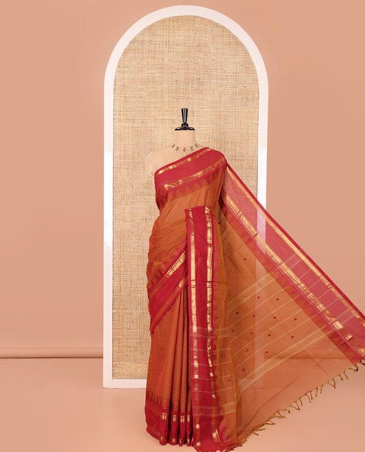 Honey Color Chettinad Cotton Saree, Subtly Sparkled with Thread Buttas All Over Its Body, Complemented by a Contrast Border Rettai Pettu Border of Paisley and Chevron Stripes, Subtly Designed Pallu, and Paired with a Matching Blouse