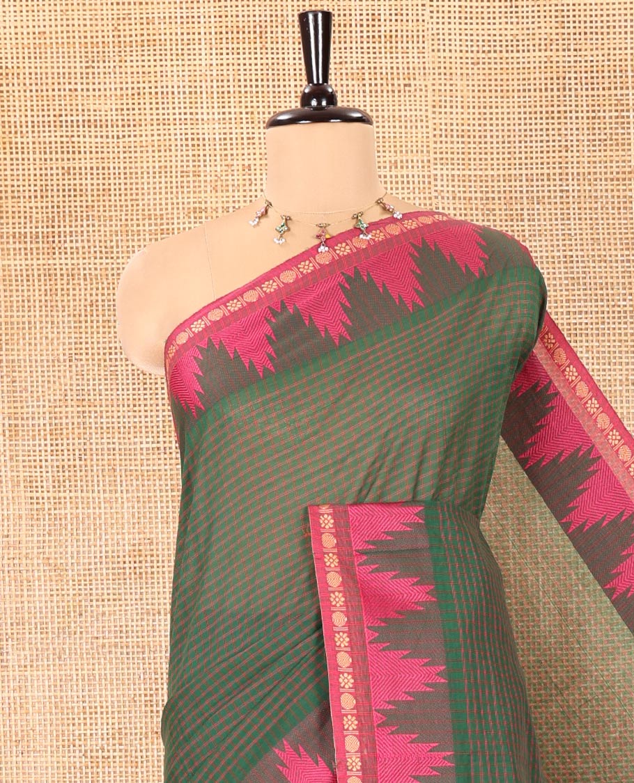 Green Chettinad Cotton Saree, Decked Up with a Checked Design on Its Body, Complemented by a Contrast Temple Border, Subtly Striped Pallu, and Paired with a Matching Blouse