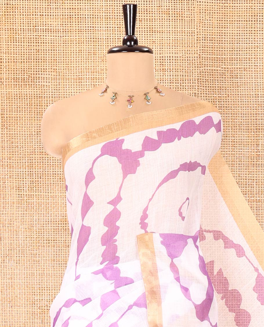 White-Violet Linen Cotton Saree, Bedecked with Shibori-Printed Body, Highlighted by Piping Border, Floral Printed Pallu, and a Contrast Blouse