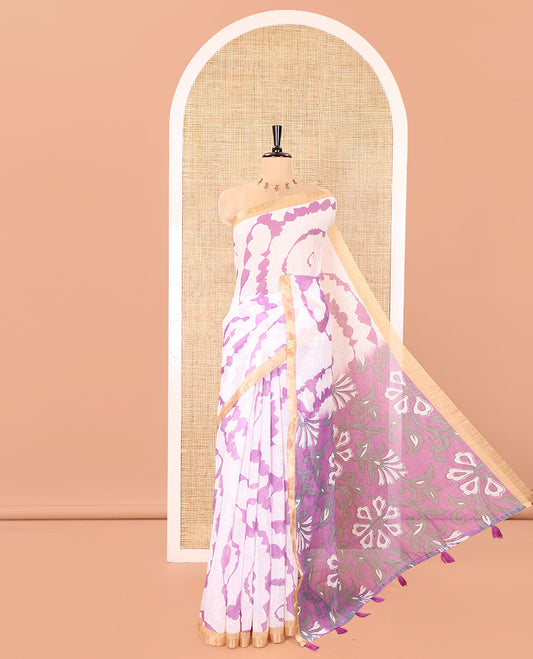 White-Violet Linen Cotton Saree, Bedecked with Shibori-Printed Body, Highlighted by Piping Border, Floral Printed Pallu, and a Contrast Blouse