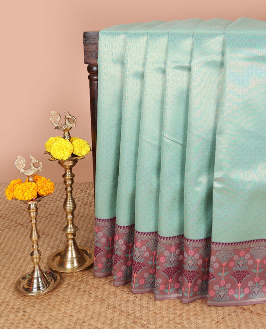 Green copper zari weaving litchi silk saree with contrast meena butta border & meena style design pallu along with contrast blouse