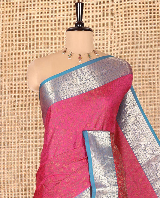 Rani Pink Elite Soft Silk Saree, Subtly Sparkled with Floral-Paisley Designs On Its Body, Complemented by Contrast Traditional Zari Designs Woven Border, Intricately Designed Pallu, and Paired with a Matching Blouse