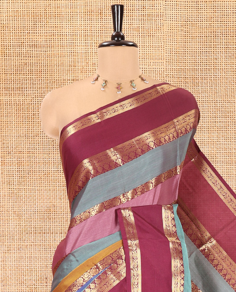 Multi Color Semi-Soft Silk Saree, Richly Detailed with Multi-color Stripes and Traditional Zari Designs On Its Body, Complemented by Contrast Rettai Pettu Traditional Zari Designs Woven Border, Grand Pallu and Paired with a Contrast Blouse