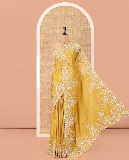 Mustard Plain Satin Crepe Saree, Accentuated with Floral Vine Thread Embroidery on Its Border, a Self-Pallu, and Paired with a Matching Blouse