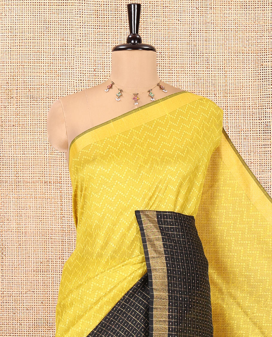 Yellow and Black Semi-Raw Silk Saree, Delicately Woven with Zig-Zag Stripes All Over Its Body, Complemented by Contrast Border of Butta Enclosed Checks, Striped Pallu, and Paired with a Contrast Blouse