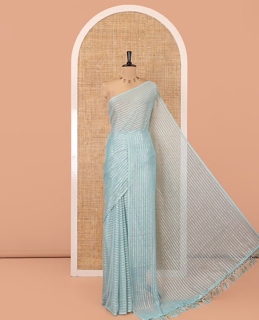 Borderless Sea Green Chiffon Saree, Gleamed Up with Horizontal Stripes on Its Body, a Self-Pallu, and Has No Blouse
