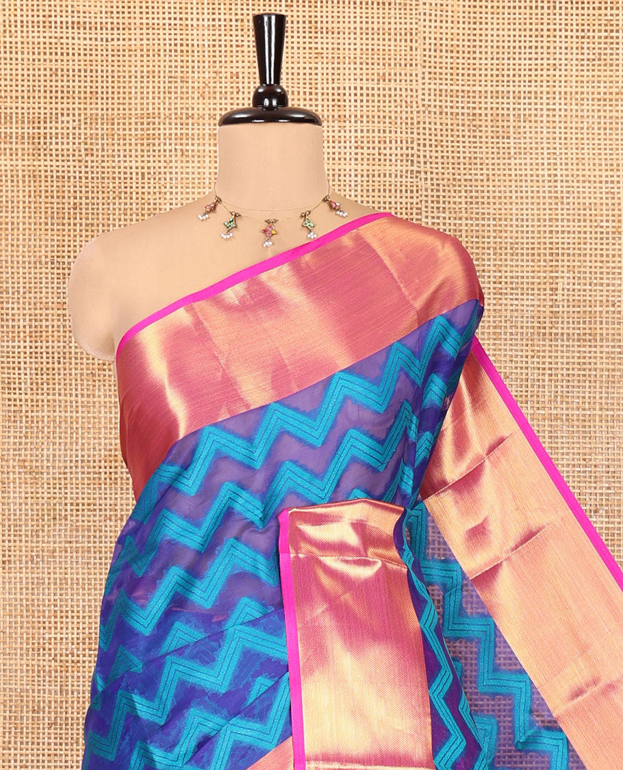 Royal Blue Semi-Organza Saree Features Pochampally Ikat Chevron Stripes, a Contrast Border, Paisley Pallu, and Contrast Blouse