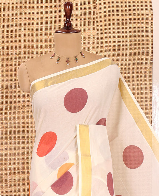 Cream Kerala Cotton Saree, Steeped with Multi-Color Polka Dots, a Zari Border, a Contrast Blouse