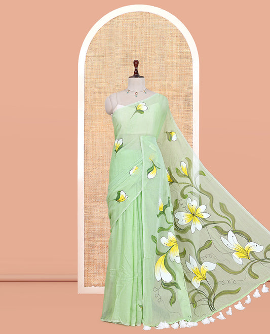 Borderless Pista Green Khadi Mul Cotton Saree Features Floral Hand-Brush Painting, and a Matching Blouse