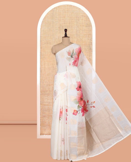 Borderless Cream Chanderi Cotton Saree Features Buttas and Floral Print, Zari-Rich Pallu, and Matching Blouse
