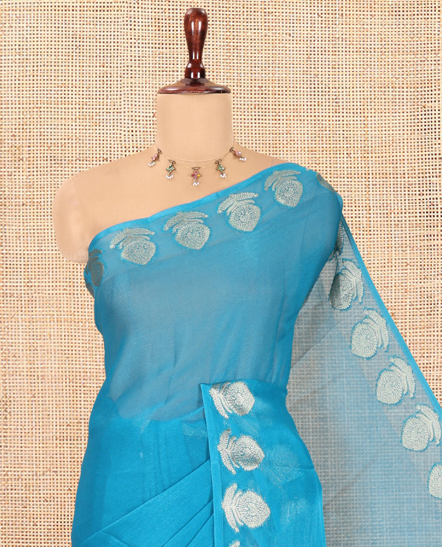 Blue Plain Moss Chiffon Saree, Highlighted by Gold Zari Floral Border, and a Self-Pallu