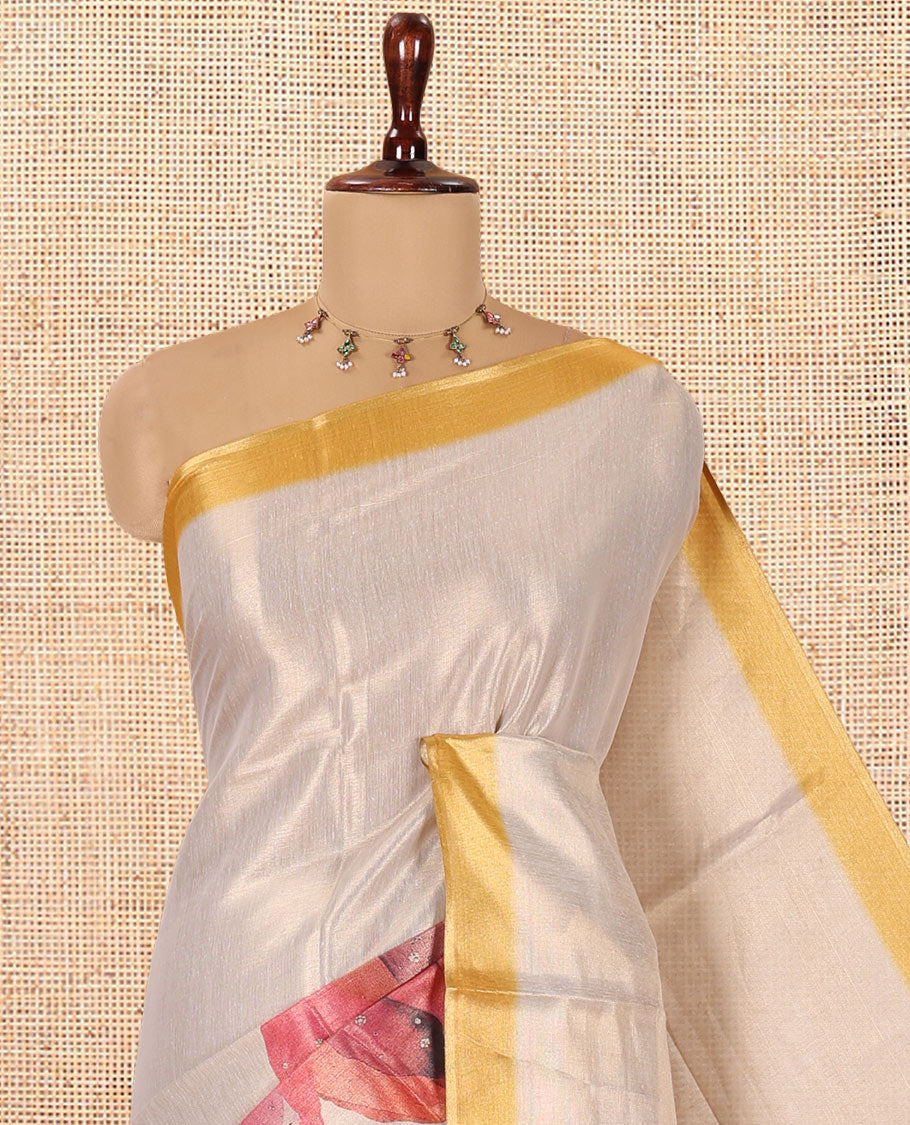 Gold Tissue Saree Features Floral Print and Stone Work, a Contrast Border, and a Contrast Blouse