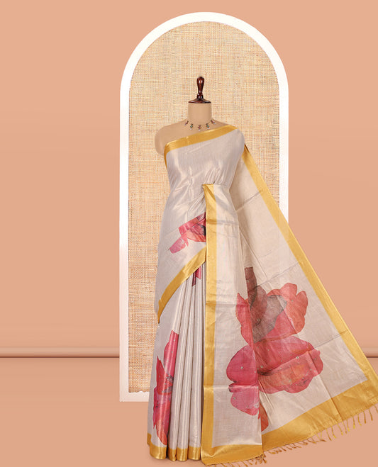 Gold Tissue Saree Features Floral Print and Stone Work, a Contrast Border, and a Contrast Blouse