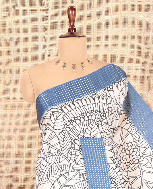 Cream-Steel Blue Dola Silk Saree, Adorned with Floral Print, a Contrast Checked Border, Pallu of Buttas, and a Contrast Blouse