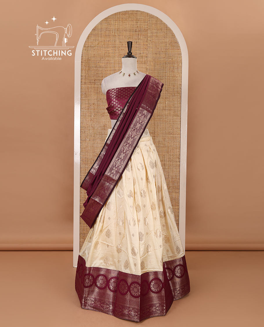 Cream-magenta semi-banaras half-saree, zari buttas & contrast traditional zari border skirt, jacquard blouse & intricately zari woven dhavani