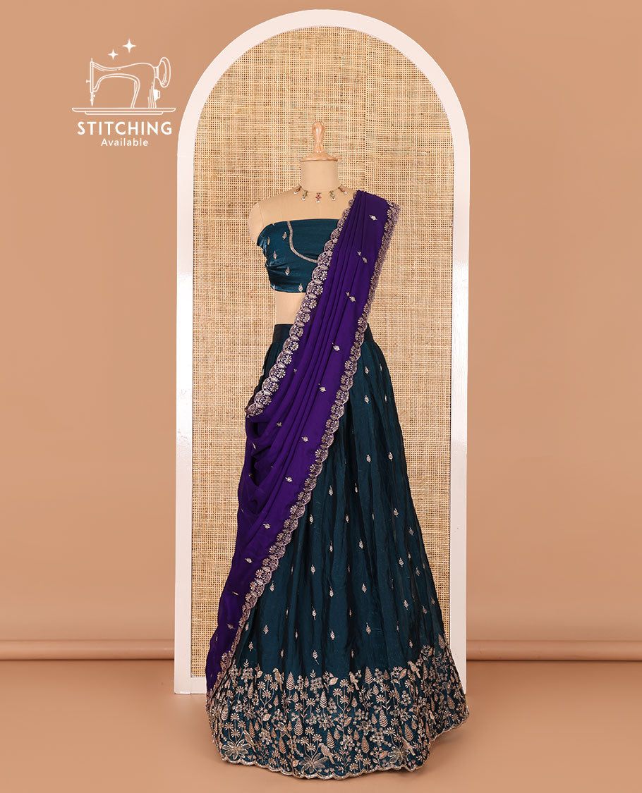 Peacock blue half-saree, floral and bird motifs embroidered velvet organza top, matching embroidered blouse, and contrast scallop embroidered syska georgette dhavani