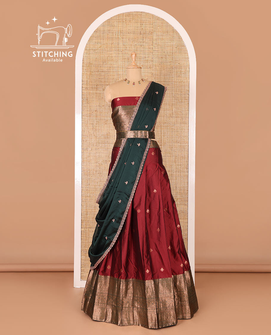 Maroon taffeta silk half-saree, zari buttas and contrast traditional zari bordered skirt, a matching blouse, and contrast embroidered satin georgette  dhavani