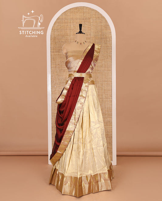 Chikku and maroon half-saree, zari checked with contrast traditional zari bordered banarasi skirt, jacquard blouse, and a contrast zari bordered syska georgette dhavani