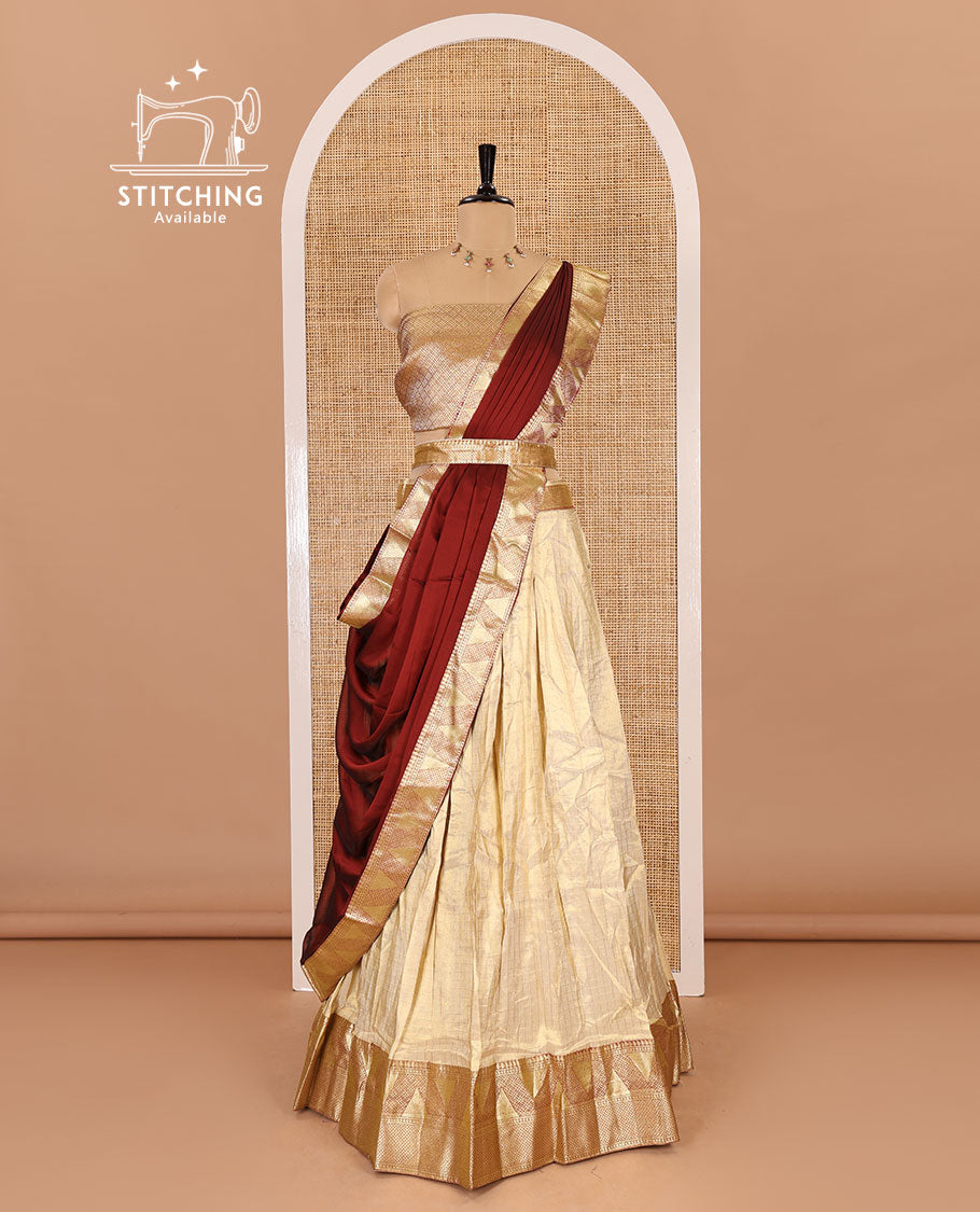 Chikku and maroon half-saree, zari checked with contrast traditional zari bordered banarasi skirt, jacquard blouse, and a contrast zari bordered syska georgette dhavani