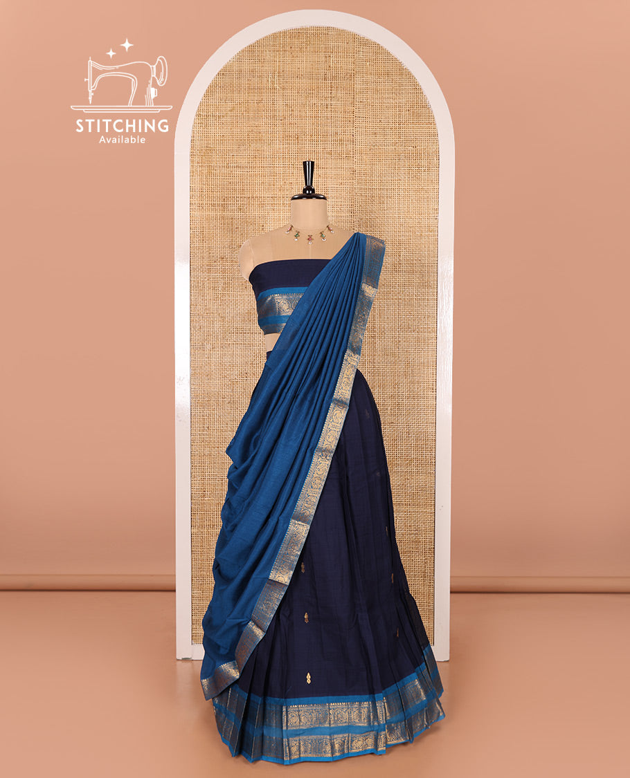 Navy Blue and Ananda Blue Chettinad Cotton Half-Saree Featuring Buttas Woven Skirt, Highlighted with a Contrast Rettai Pettu Peacock Motifs Woven Zari Border, a Subtly Woven Matching Blouse, and a Vichitra Silk Contrast Traditional Zari-Bordered Dhavani
