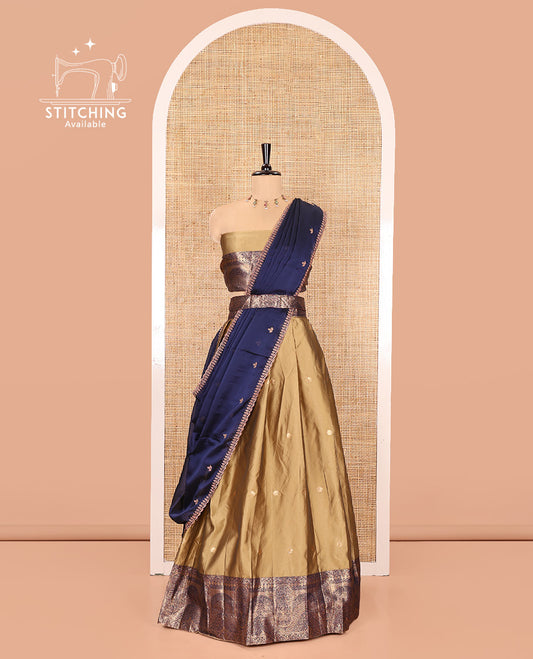 Liril Green and Blue Semi-Banarasi Half-Saree, Delicately Woven with Zari Buttas on Its Skirt, Complemented by a Contrast Geometric Patterns Zari Woven Border, Paired with a Matching Blouse, and a Contrast Satin Georgette Embroidered Scallop Dhavani